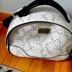 Victoria’s Secret snake print makeup bag